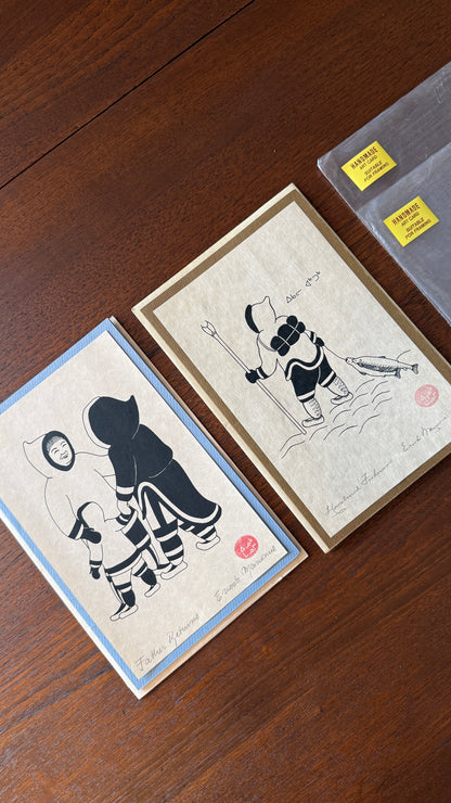 Silkscreen Prints entitled "Father Returns" and “ Homebound Fisherman”by Canadian Inuit artist Enook Manomie