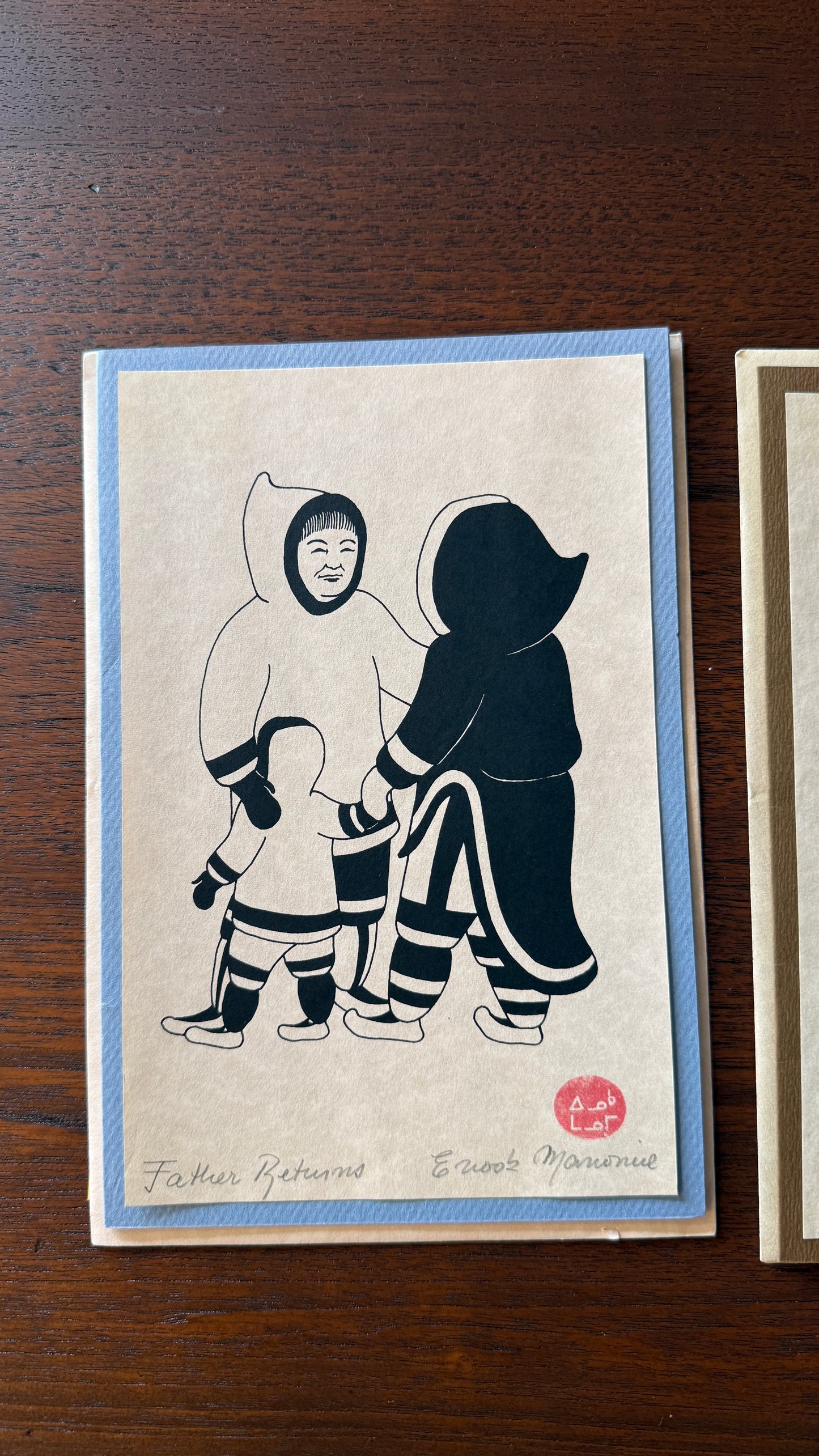 Silkscreen Prints entitled "Father Returns" and “ Homebound Fisherman”by Canadian Inuit artist Enook Manomie